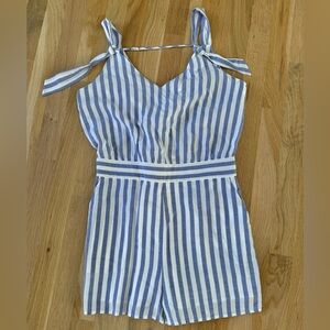 Blue and white sleeveless romper shorts. 100% cotton. Vneck Size Small